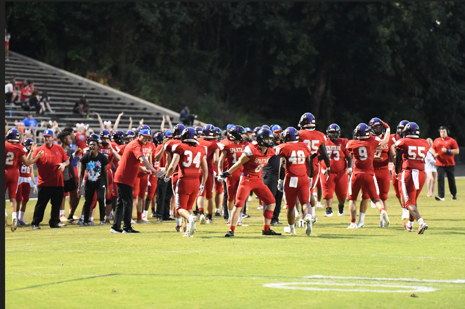 All the Sanderson High School football team on the field together after a game.